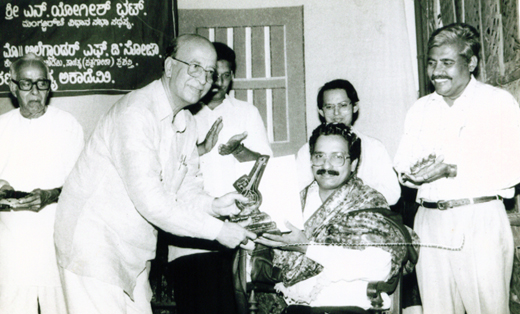Dr.Edward L. Nazareth receiving konkani sahitya academy award 